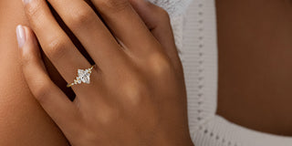 Close-up of a marquise cut diamond ring, showcasing its elongated shape and brilliant facets.