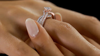 Close-up of an engagement ring placed on a legal document symbolizing ownership disputes after a breakup or divorce.