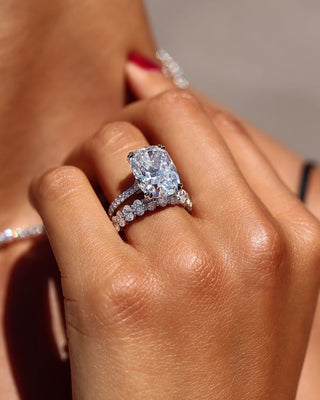 A lab-grown and a natural diamond side by side on a jeweler’s tray, highlighting visual similarities and ethical differences. 