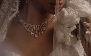 A lab diamond engagement ring resting on a palm leaf, symbolizing eco-friendly elegance for modern brides in Dubai. 