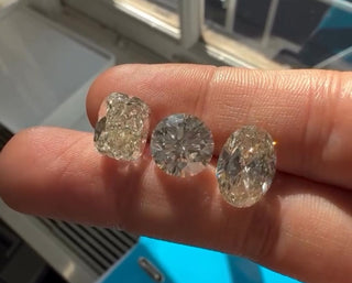 Round lab-grown diamond with M color grade sparkling under light, showing superior brilliance compared to other diamond shapes.