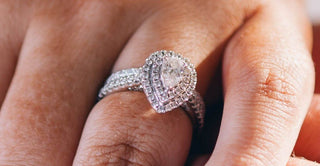 F color diamond ring displayed under lighting to highlight its near-colorless brilliance and clarity.