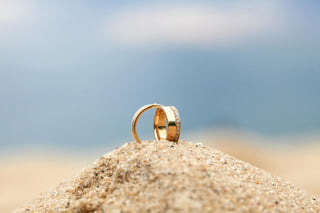 Jewelry glistening in summer sunlight with tips for protecting pieces at the beach or pool.