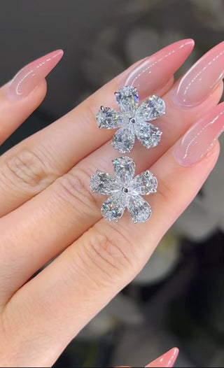 10CT Lab Diamond Flower Studs: 18K gold earrings set with ten 1-carat lab-grown diamonds arranged in a flower pattern.
