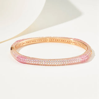Blush Pink Bangle in 925 sterling silver with 18K gold plating, featuring pink and white lab-created sapphires in a soft, romantic design.