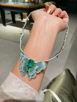 Butterfly of Eden Necklace with green lab sapphire in butterfly design on sterling silver snake chain – nature-inspired sapphire necklace for women
