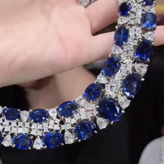 Sterling silver choker necklace with ruby and sapphire stones in royal tapestry design, inspired by Indian heritage — Azzallure Carpet Choker.

