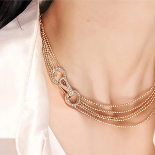 Clasped Essence Necklace in rose gold choker design with lab sapphire centerpiece – elegant essence-inspired gold necklace for women

