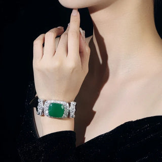 Emerald Chalcedony Wristband with green chalcedony center, framed by white sapphires, set in sterling silver with platinum plating.