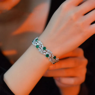 Emerald Reign Bracelet in sterling silver with lab-created green sapphires – elegant emerald bracelet design for women.