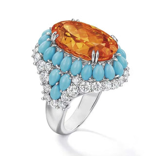 Azzallure Fire and Frost Ring in sterling silver featuring a fiery orange lab sapphire center, surrounded by icy turquoise and lab sapphires—unisex cocktail ring with elemental contrast.