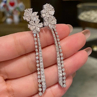 Flower bouquet tassel earrings in 925 sterling silver with lab-created sapphires and platinum finish, designed like cascading floral drops.