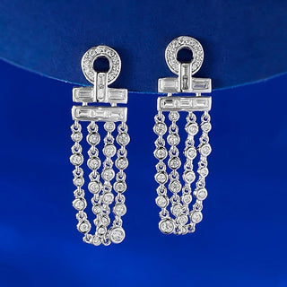 Frostlight Drop Earrings: 925 sterling silver drop earrings for women set with shimmering lab-created sapphire stones.