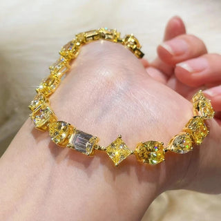 Golden Hour Bracelet in sterling silver with yellow lab sapphires – gold bracelet design inspired by sunlight and serenity.