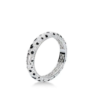 Leopard Spots Bangle crafted in 925 sterling silver with lab-created sapphires, featuring bold animal-inspired pattern in a sleek, travel-friendly design.