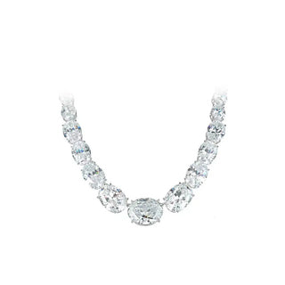 Meteor Fall Necklace with lab sapphires on sterling silver chain, capturing celestial elegance.

