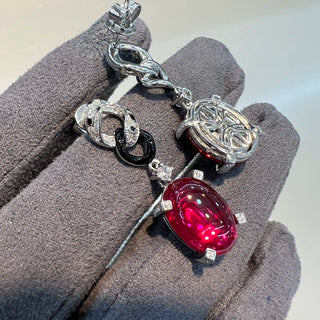 Panthera Rouge Earrings in sterling silver with a ruby center and lab-created sapphires, offering a bold, elegant design.