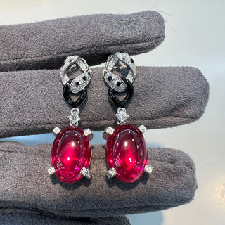 Panthera Rouge Earrings in sterling silver with a ruby center and lab-created sapphires, offering a bold, elegant design.