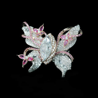 Papillon Pink Ring featuring a delicate butterfly-inspired design with shimmering pink gemstones, showcasing fine craftsmanship and elegant detail.
