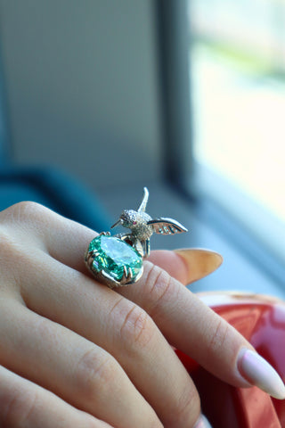Paraiba Bird’s Nest Ring in sterling silver with crushed ice-cut Paraiba tourmaline, sculptural gemstone statement ring design
