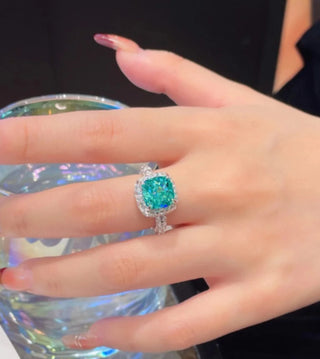 Princess Paraiba Ring by Azzallure featuring lab-created Paraiba-toned sapphires in a delicate prong setting on polished 925 sterling silver.

