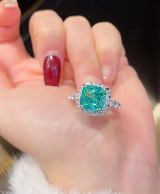 Princess Paraiba Ring by Azzallure featuring lab-created Paraiba-toned sapphires in a delicate prong setting on polished 925 sterling silver.


