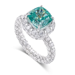 Princess Paraiba Ring by Azzallure featuring lab-created Paraiba-toned sapphires in a delicate prong setting on polished 925 sterling silver.


