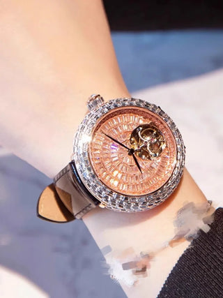Rosaline women’s quartz watch featuring stainless steel case, sapphire crystal dial, and purple leather strap.