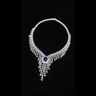 Royal Blue Necklace with luminous lab sapphire set in platinum-plated sterling silver, reflecting regal charm and refined elegance.


