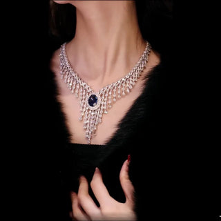 Royal Blue Necklace with luminous lab sapphire set in platinum-plated sterling silver, reflecting regal charm and refined elegance.

