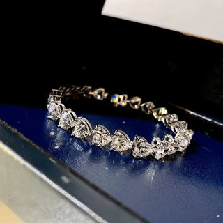 Seraphine Heart Bracelet in sterling silver with heart-shaped Moissanite – elegant heart bracelet for girls and women.