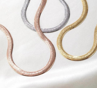Serpentina Necklace in sterling silver with rose gold, 18K gold, and 24K gold finishes, designed for women. Elegant and timeless design.