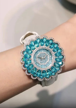Sirena women’s aqua-blue quartz watch with stainless steel case and sapphire crystal dial.
