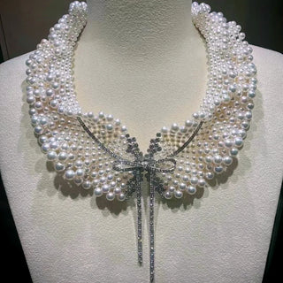 Sunken Promise Necklace in sterling silver with luminous freshwater pearls.
