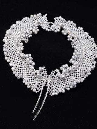 Sunken Promise Necklace in sterling silver with luminous freshwater pearls.
