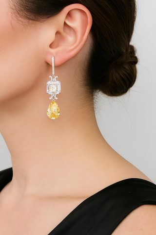 Sunveil Earrings in sterling silver with yellow lab sapphires, offering a delicate shimmer of sunlight-inspired elegance.