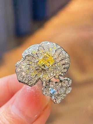 The Daffodils Ring in sterling silver with a radiant lab sapphire, floral-inspired cocktail ring for women in sculptural spring design