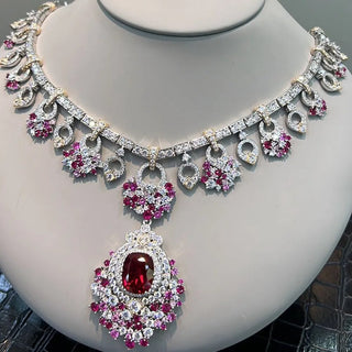 Sterling silver long necklace with vivid ruby centrepiece and regal red tones — Azzallure Maharani Ruby Necklace inspired by royal Indian heritage.

