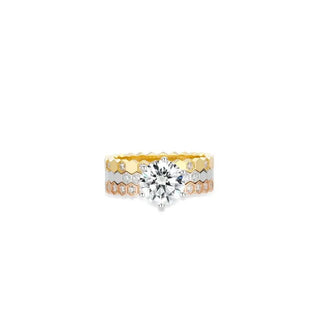 Trinity of Grace Ring in sterling silver with central lab sapphire, designed to resemble three stacked rings in one seamless piece.