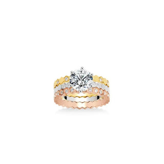 Trinity of Grace Ring in sterling silver with central lab sapphire, designed to resemble three stacked rings in one seamless piece.