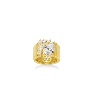 Water Drop Cocktail Ring with bold pear-cut lab sapphire and scattered stones on a textured gold band