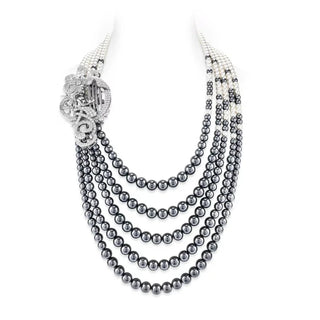 Élan de Perle Layered Necklace in sterling silver with black and white pearls, accented by lab-created sapphires.