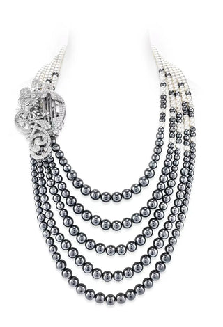 Élan de Perle Layered Necklace in sterling silver with black and white pearls, accented by lab-created sapphires.