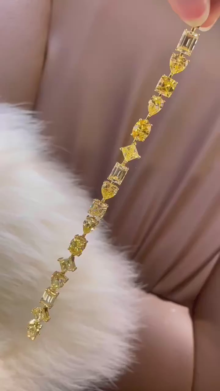 Golden Hour Bracelet in sterling silver with yellow lab sapphires – gold bracelet design inspired by sunlight and serenity.