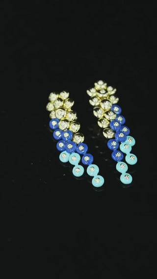 Imperial Dusk stud earrings in 925 sterling silver set with deep lab-created sapphire stones.