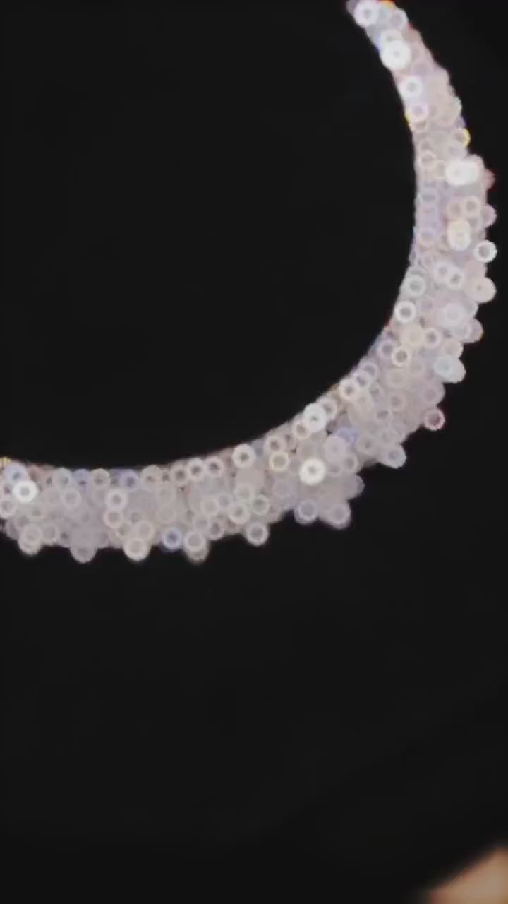 Blossom Adorn Necklace with lab sapphires in sterling silver, capturing the beauty of petals in motion, crafted for a timeless, feminine appeal.

