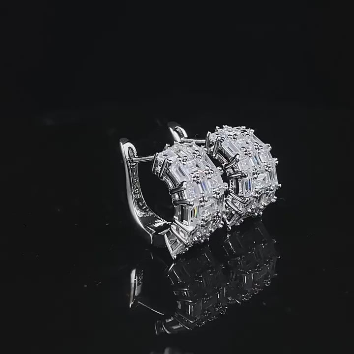 Whispers of Ice Earrings – Sterling silver earrings with lab-created sapphires, offering a delicate glow inspired by winter’s frost and elegance.