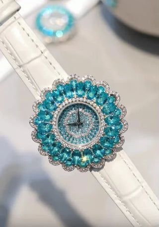 Sirena women’s aqua-blue quartz watch with stainless steel case and sapphire crystal dial.