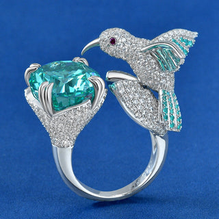 Paraiba Bird’s Nest Ring in sterling silver with crushed ice-cut Paraiba tourmaline, sculptural gemstone statement ring design

